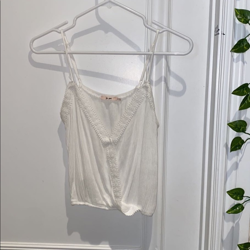 size small white cropped t bought at a surf shop